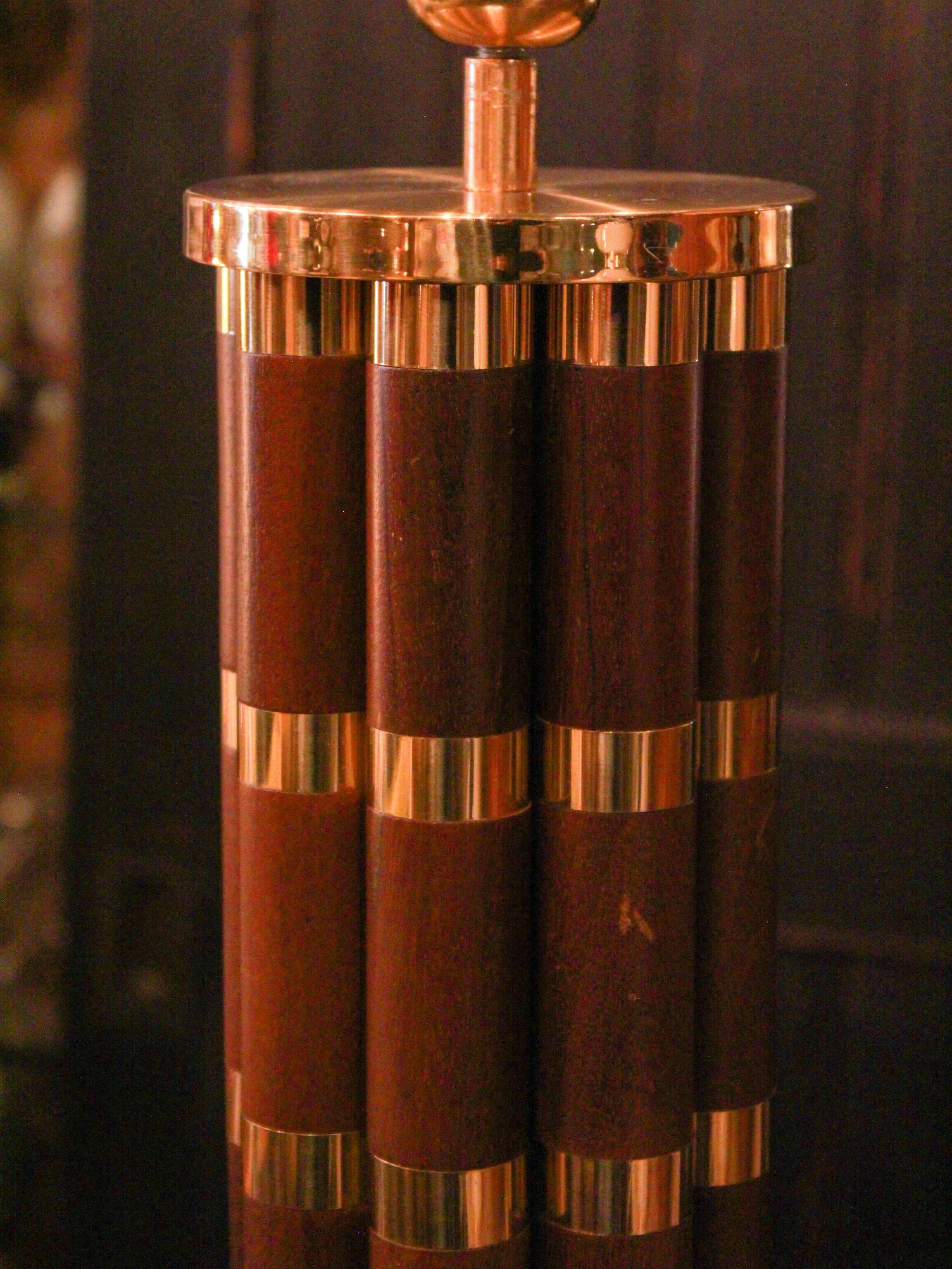 Pair of wooden and brass table lamps, French classic style.