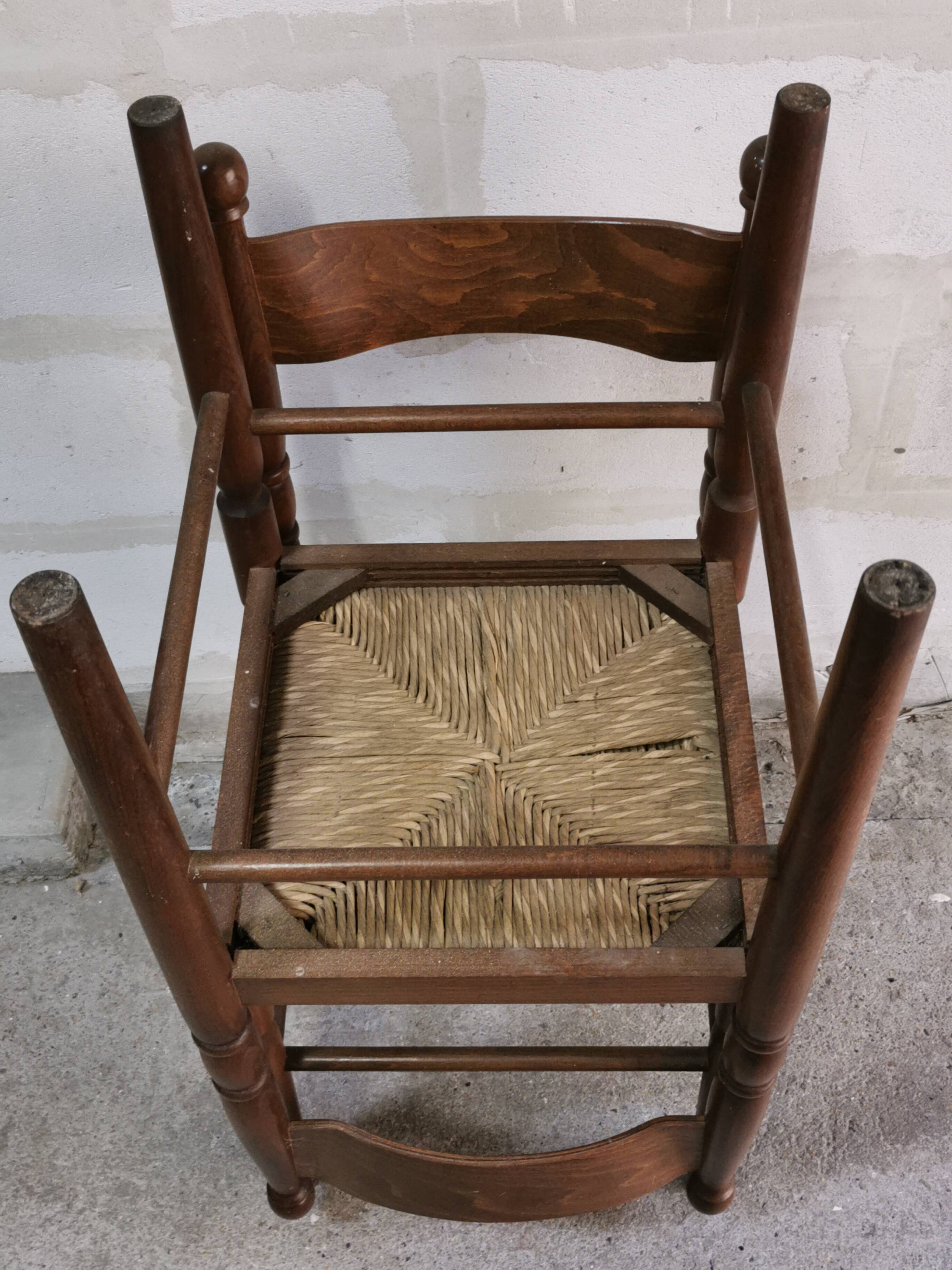 Pair of vintage wood and straw chairs