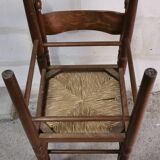 Pair of vintage wood and straw chairs