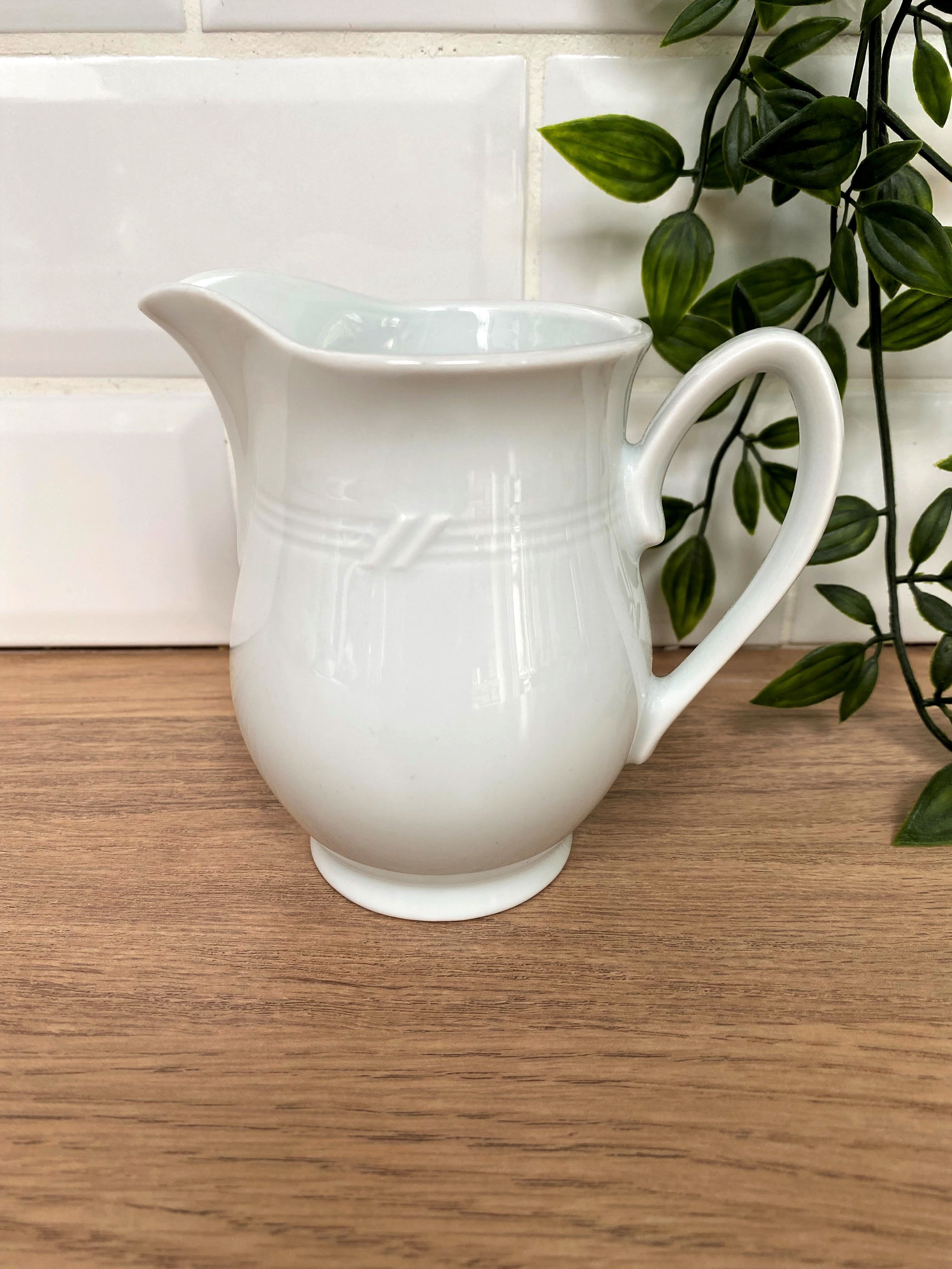 Porcelain milk pot