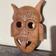 Masque artisanal en bois