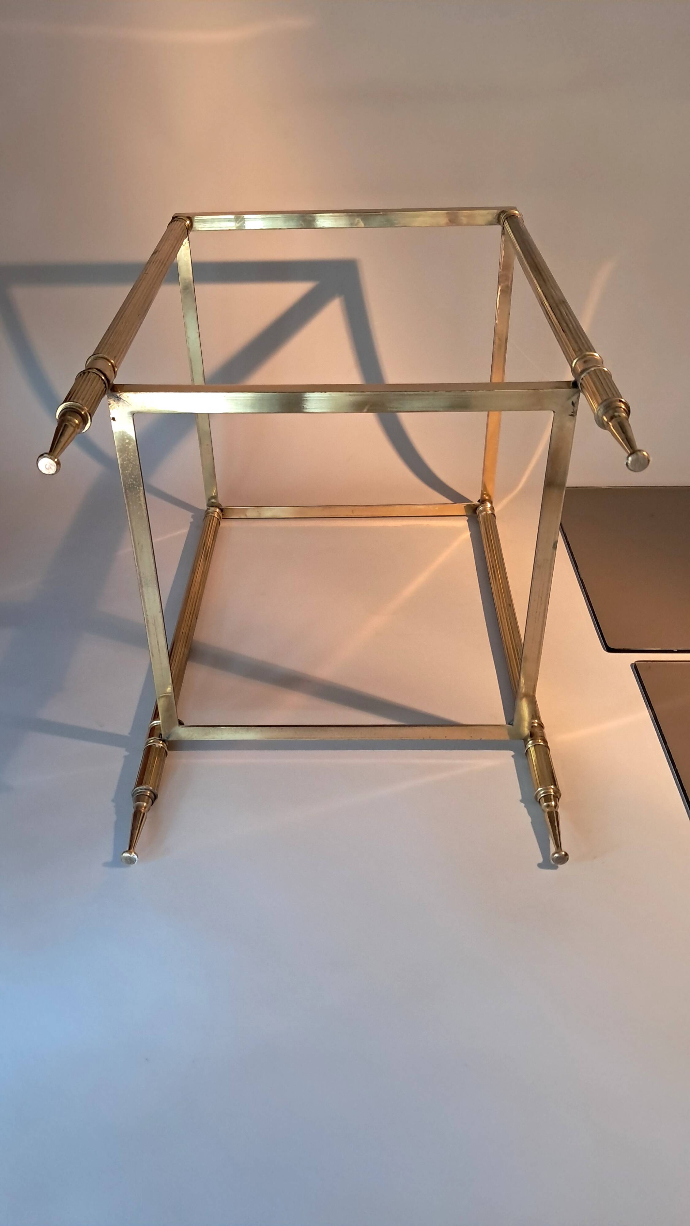 Gilded brass and smoked glass end table, 1960s.