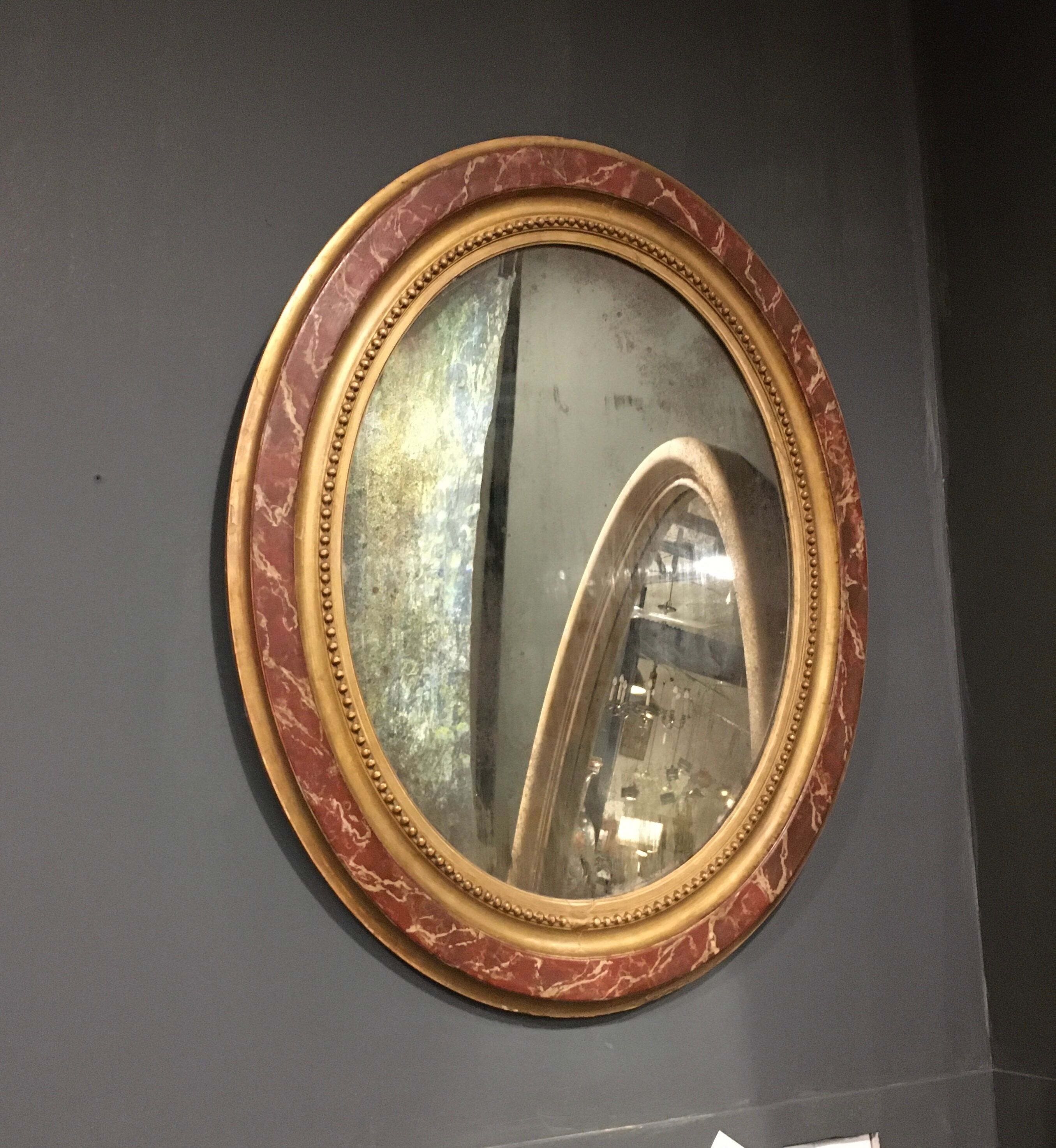 Oval gilded mirror 107x90cm