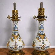 Gien: pair of antique oil lamps in fine earthenware richly decorated.