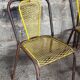 Six chaises en métal perforé seducta René Malaval