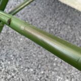 Green rattan armchair