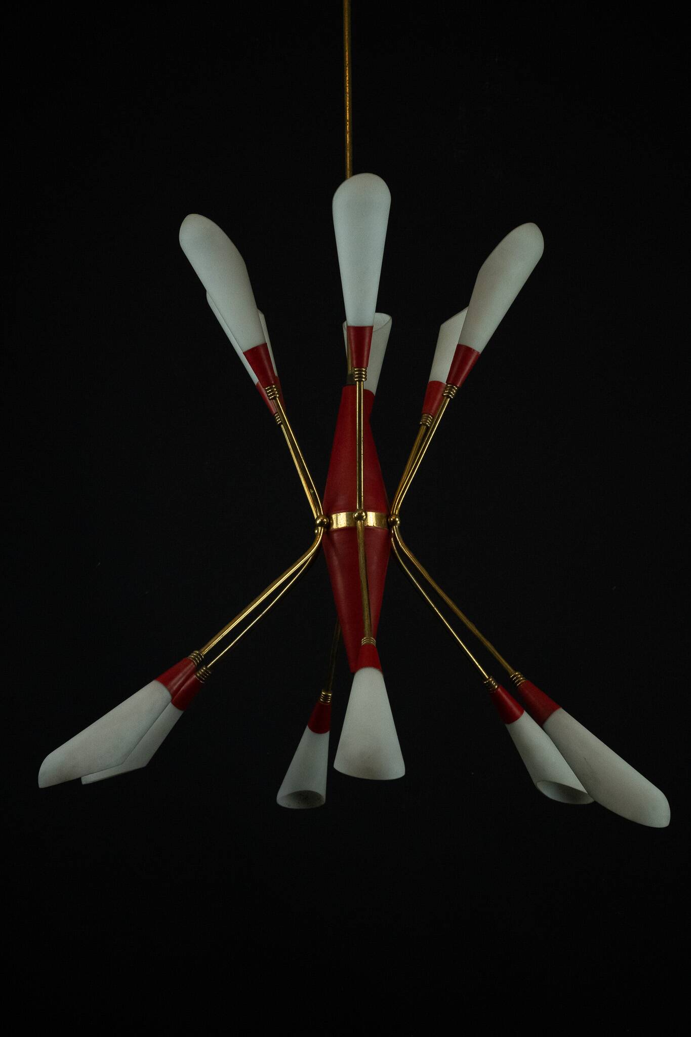 Mid-Century 12 lights chandelier in the manner of Stilnovo. Italy 1950s