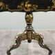 Table pliante Napoléon III en bois laqué noir et décor doré, XIXe siècle