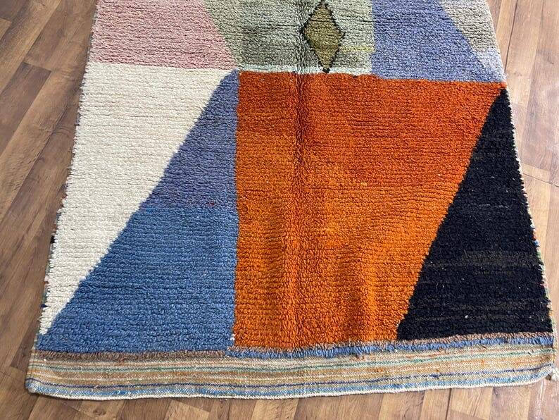 Handmade natural wool rug with colourful patterns 150/250 cm