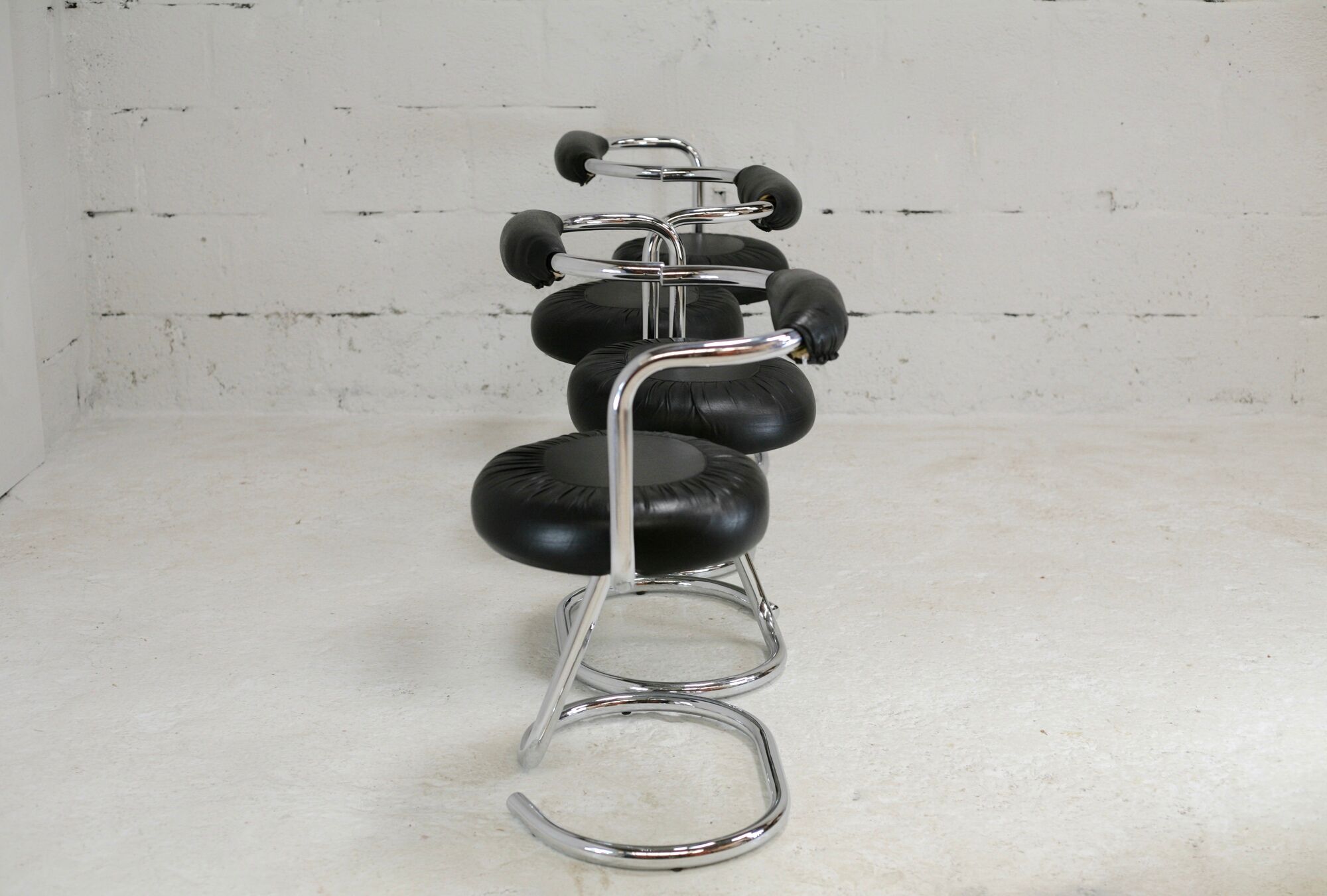 4 chairs tubular steel, imitation black leather, Italy, circa 1970