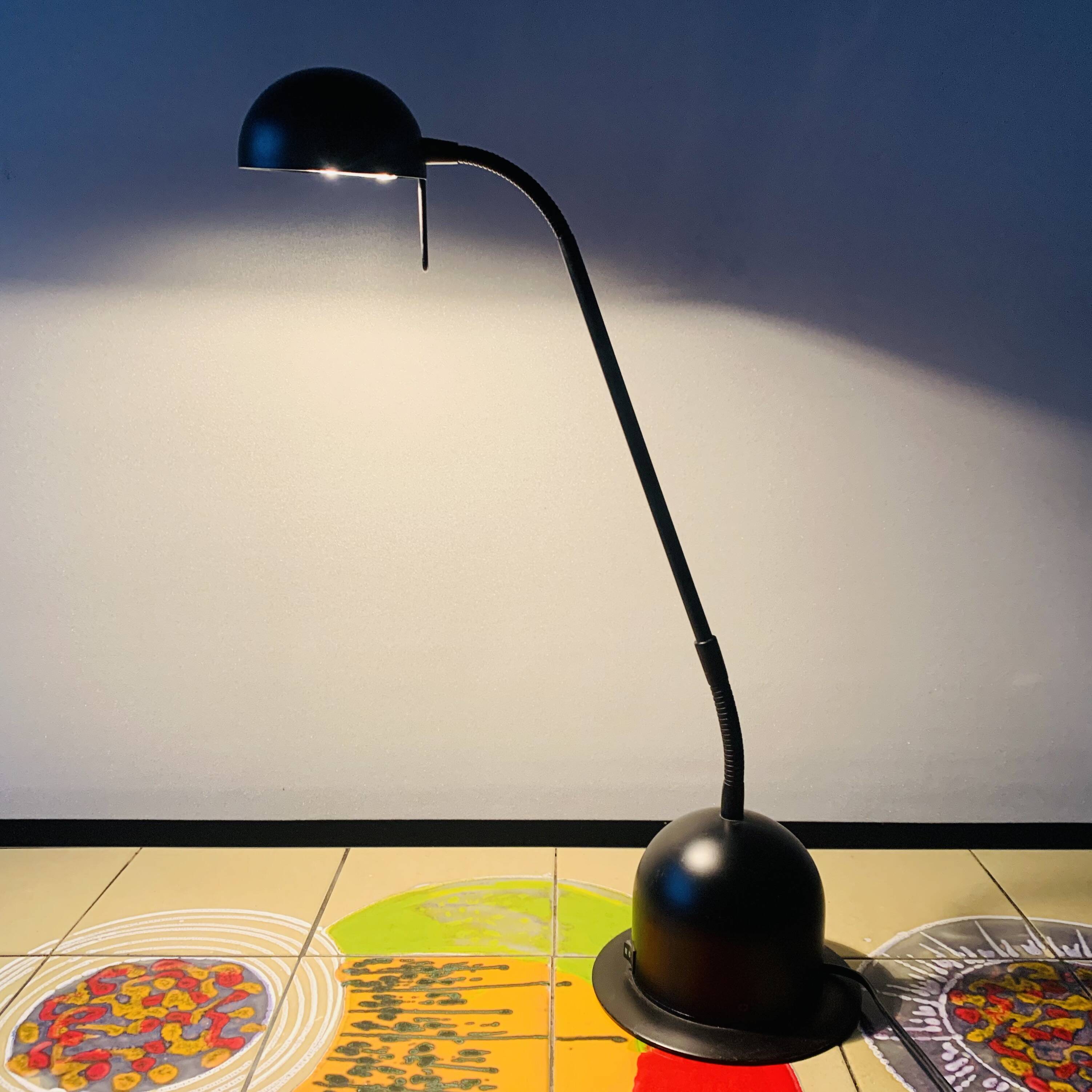Massive vintage desk lamp in black metal
