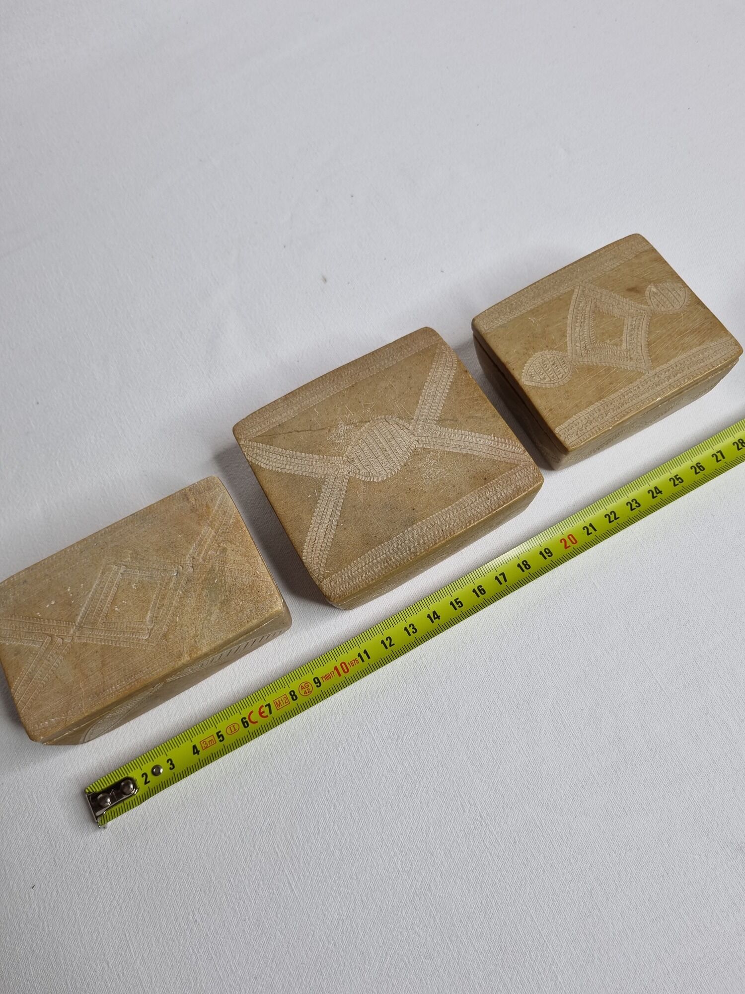 Set of three soft stone jewellery boxes decorated with traditional Tuareg motifs