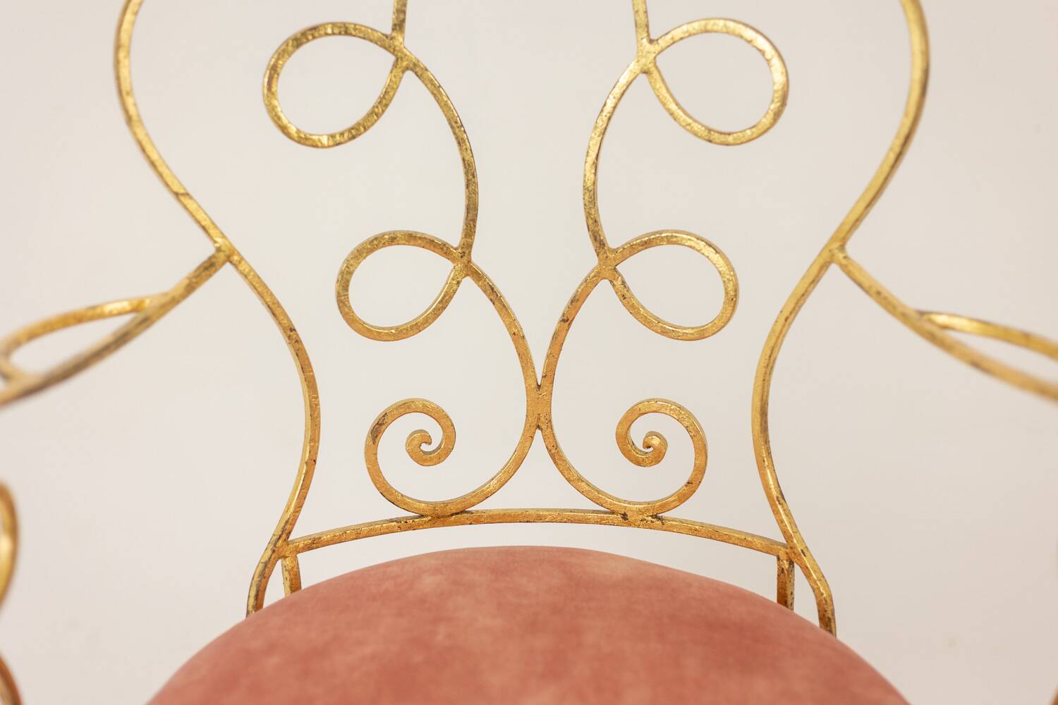 Pair of wrought iron and gilded armchairs, circa 1990