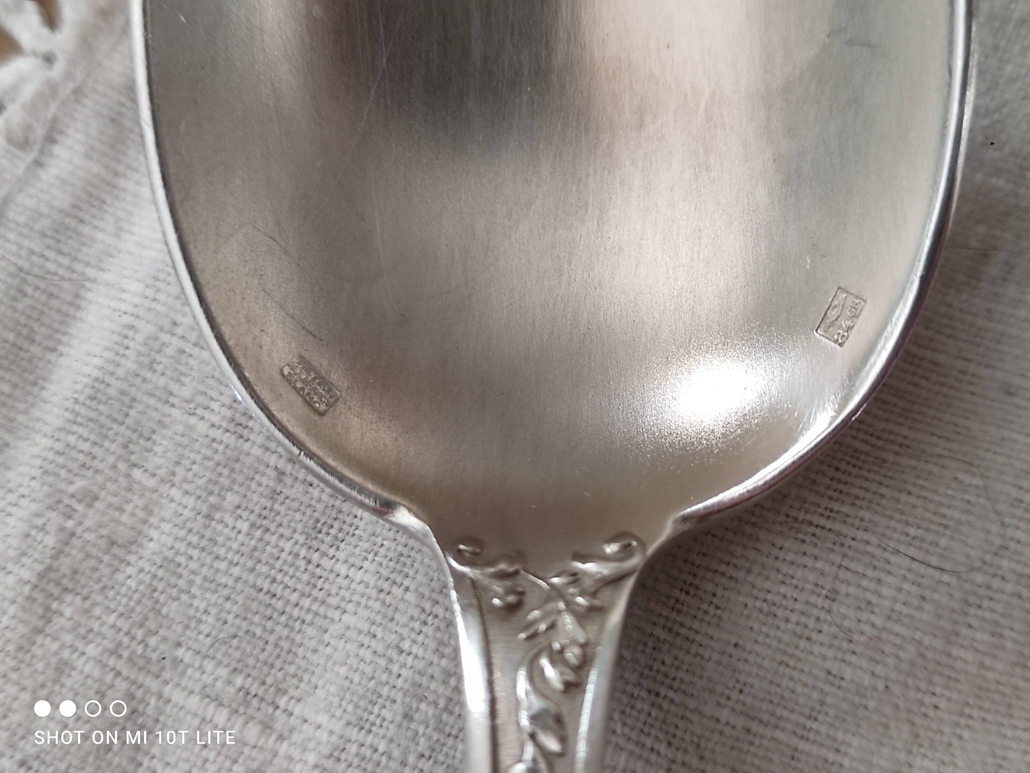 Set of 12 old silver-plated soup spoons