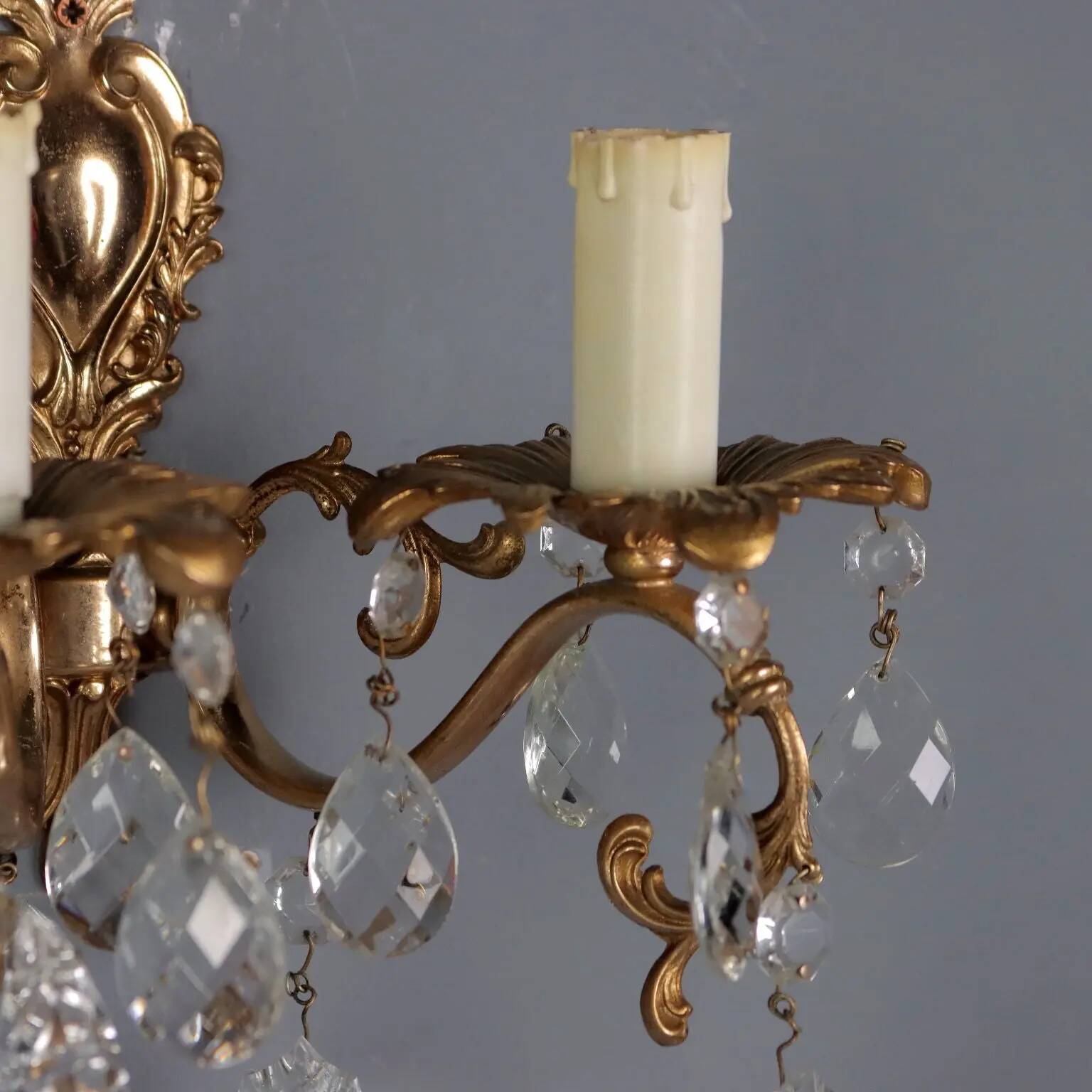Antique wall sconces in Rococo style, bronze, Italy, 20th century.
