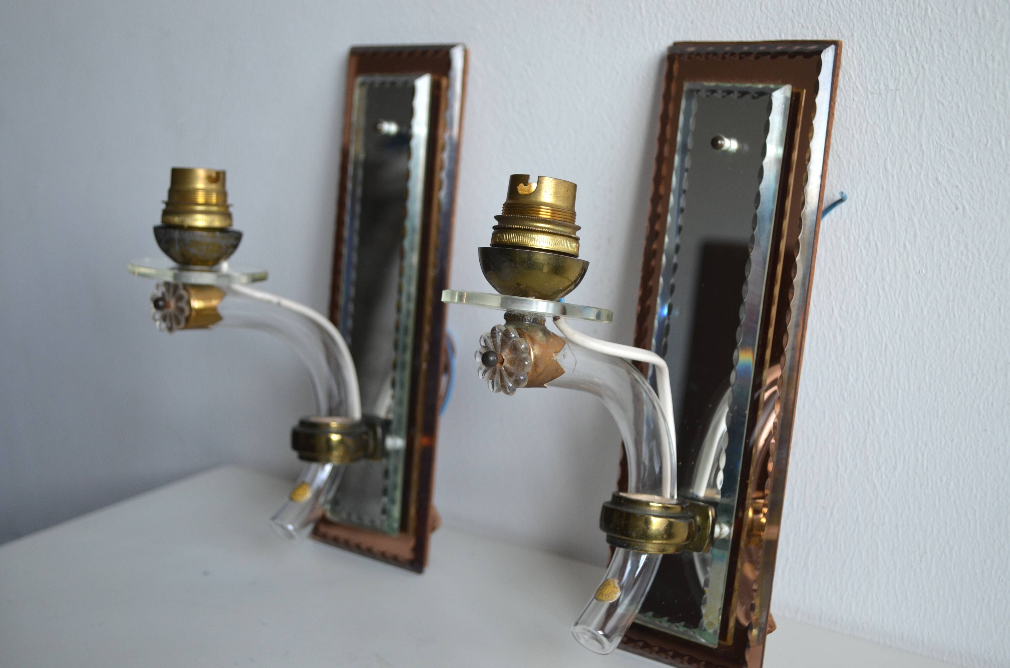 Pair of mirror and crystal wall lights from the 1940s-50s.
