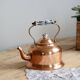 Vintage kettle in copper and ceramic