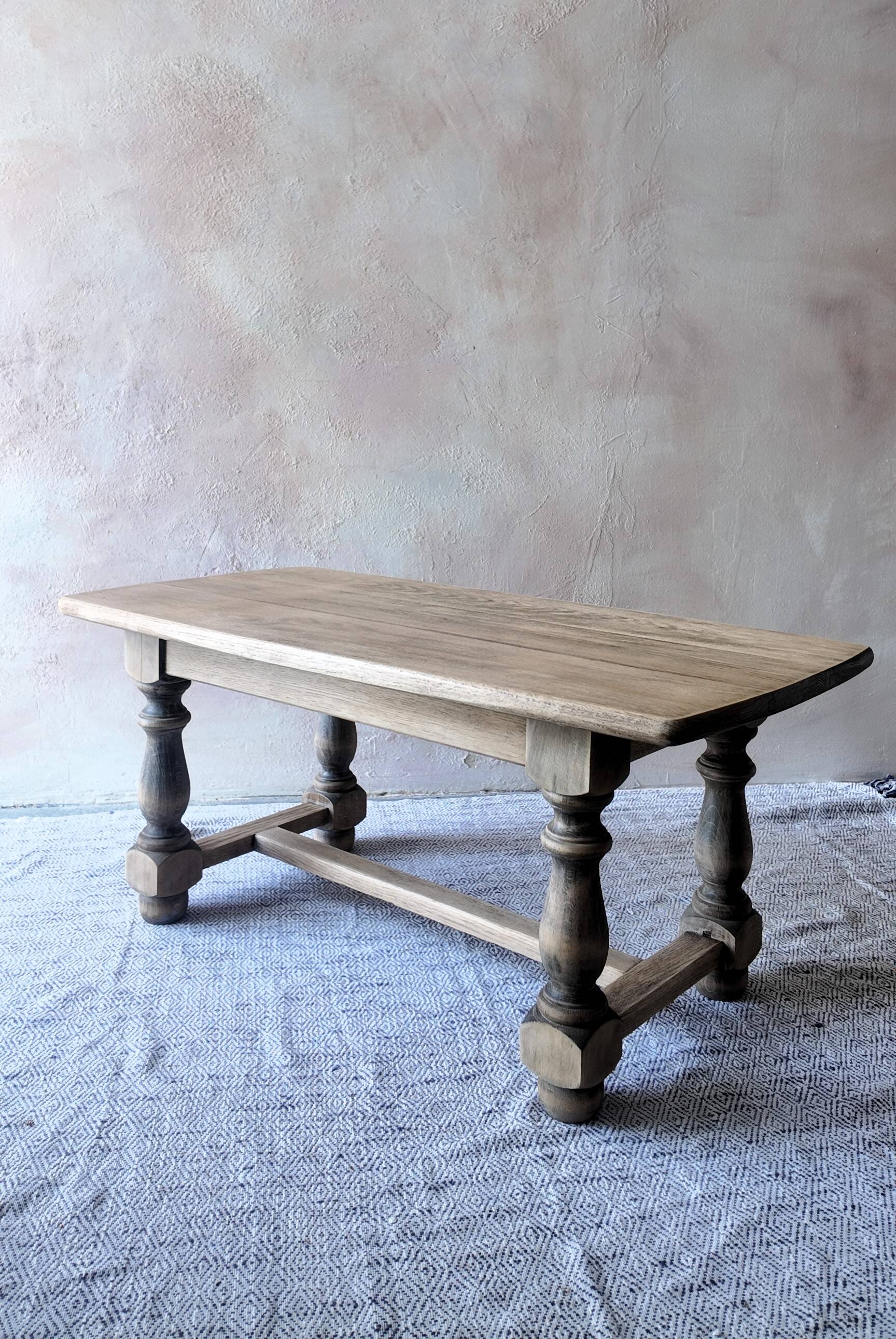 Old farmhouse coffee table in solid oak - turned legs and stretcher.