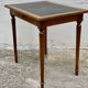 Desk XIXth Century, turned feet, walnut and leather