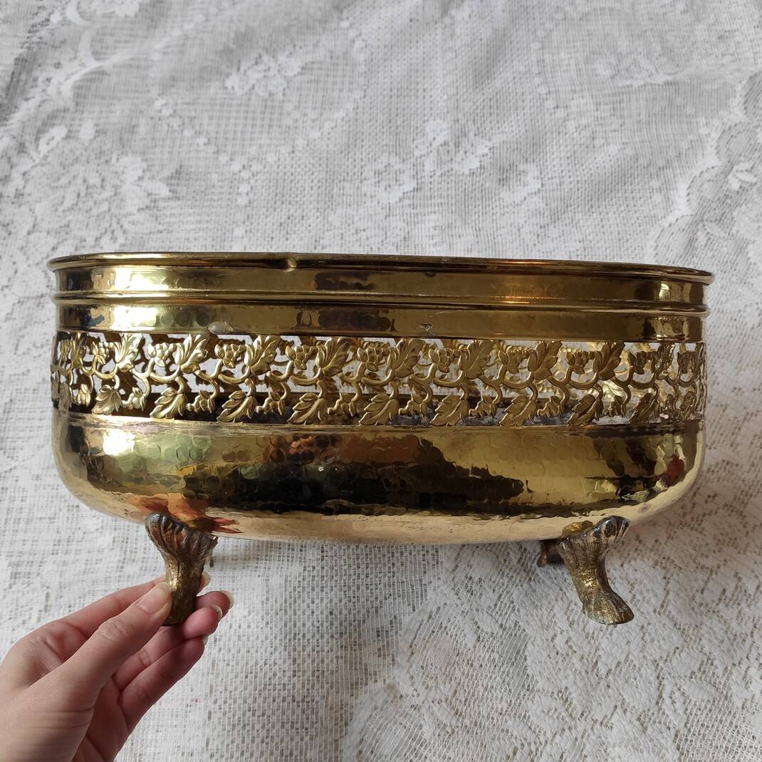 Old golden metal planter