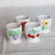 4 vintage Afibel porcelain egg cups - Barbotine decor