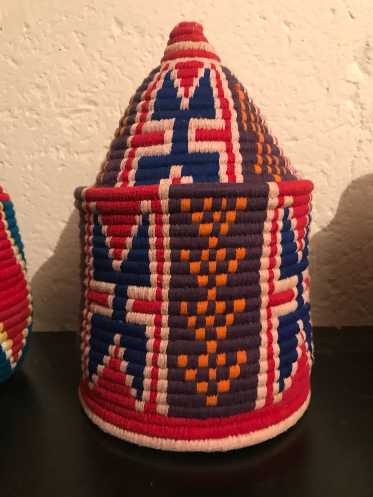 Berber wool and red and blue raffia basket