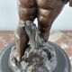 Candelabra with cherub in patinated bronze