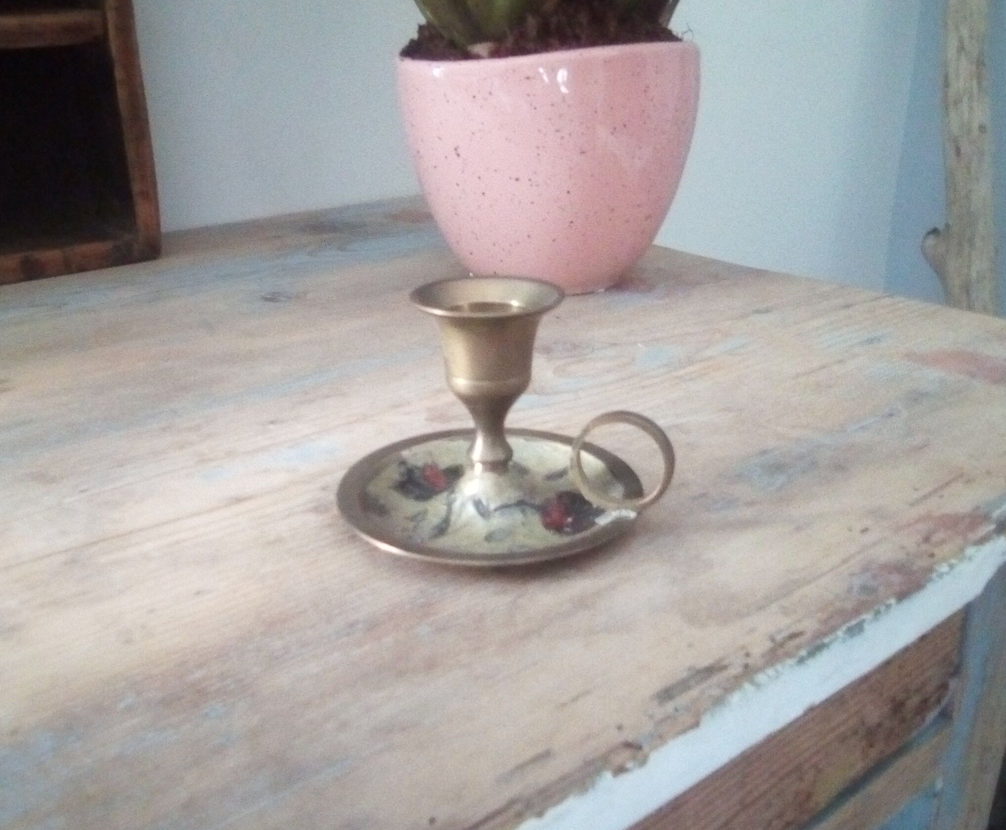 Vintage candlestick in brass cellar rat