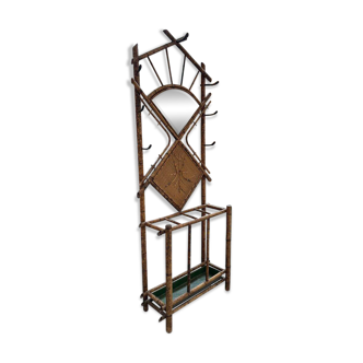 Entrance hall wardrobe in bamboo and rattan from the early 20th century.