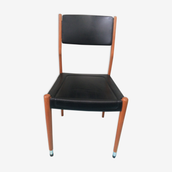 Chaise design scandinave en skai noir et bois clair vintage 1960