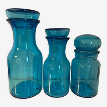 Set of three blue glass apothecary bottles