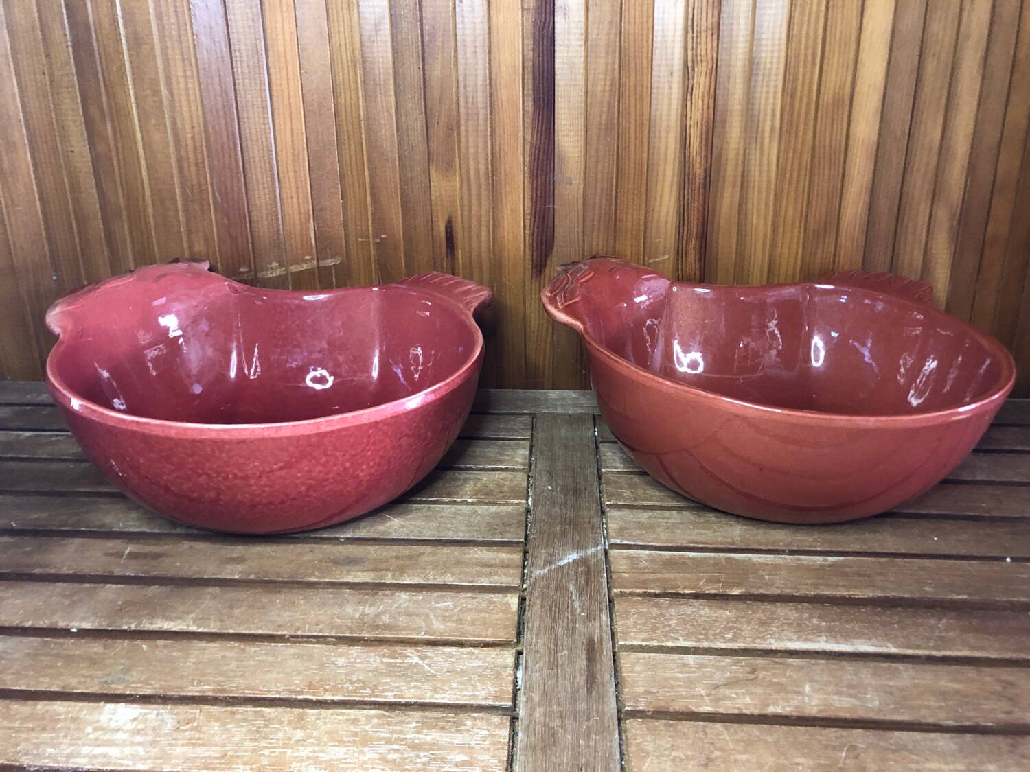 Pair of red ceramic hen dish