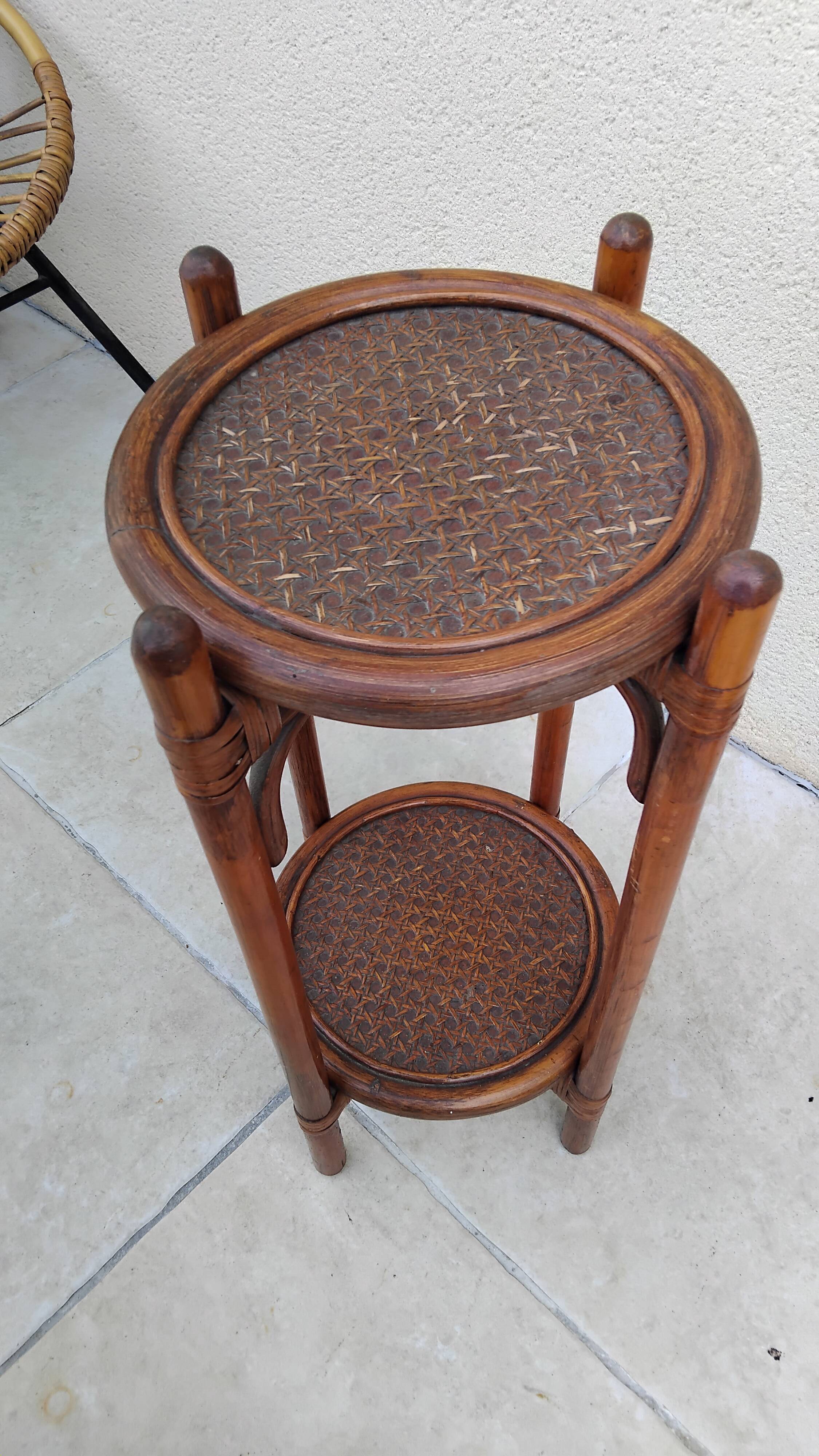Vintage folding wooden and wicker side table.