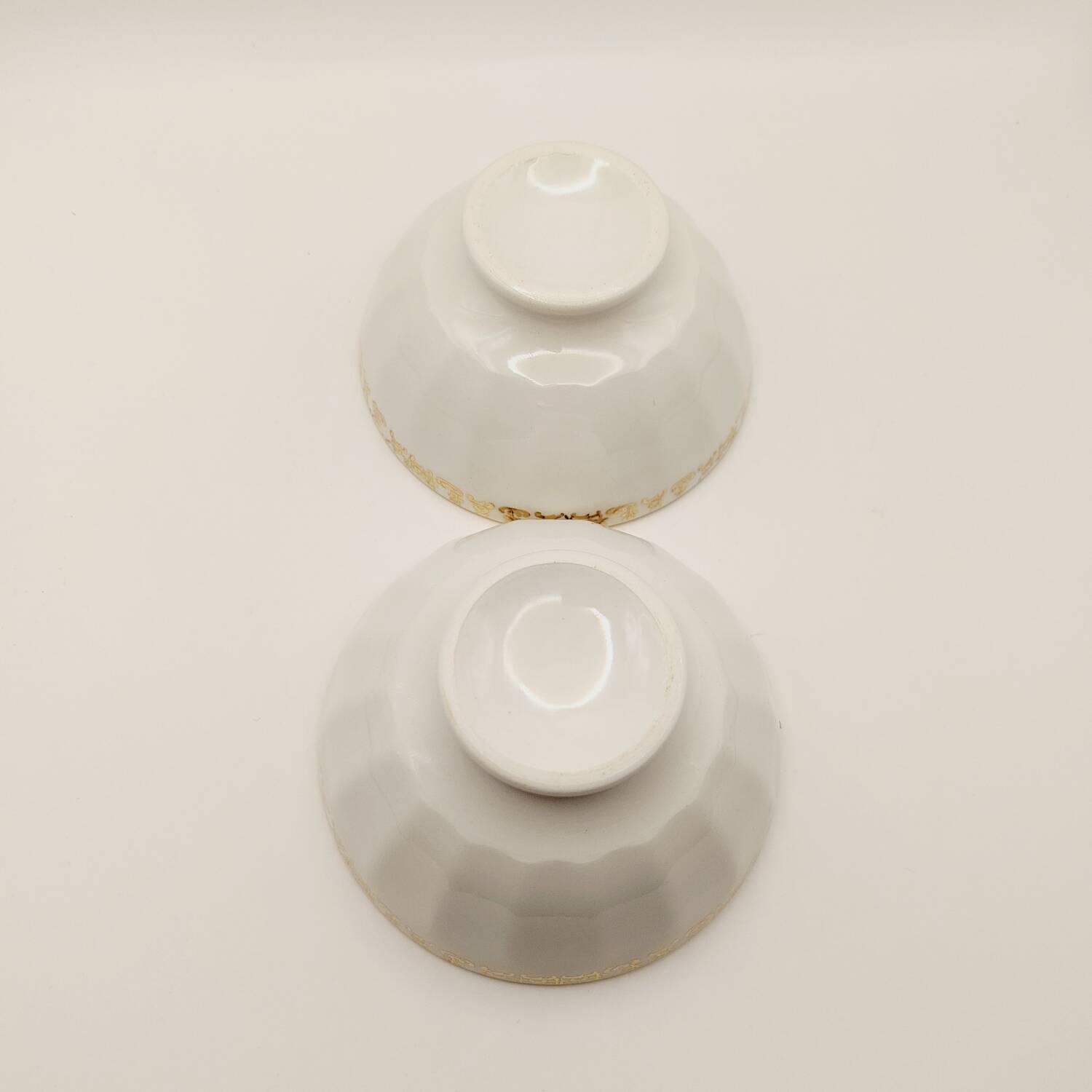 2 small gold ceramic bowls