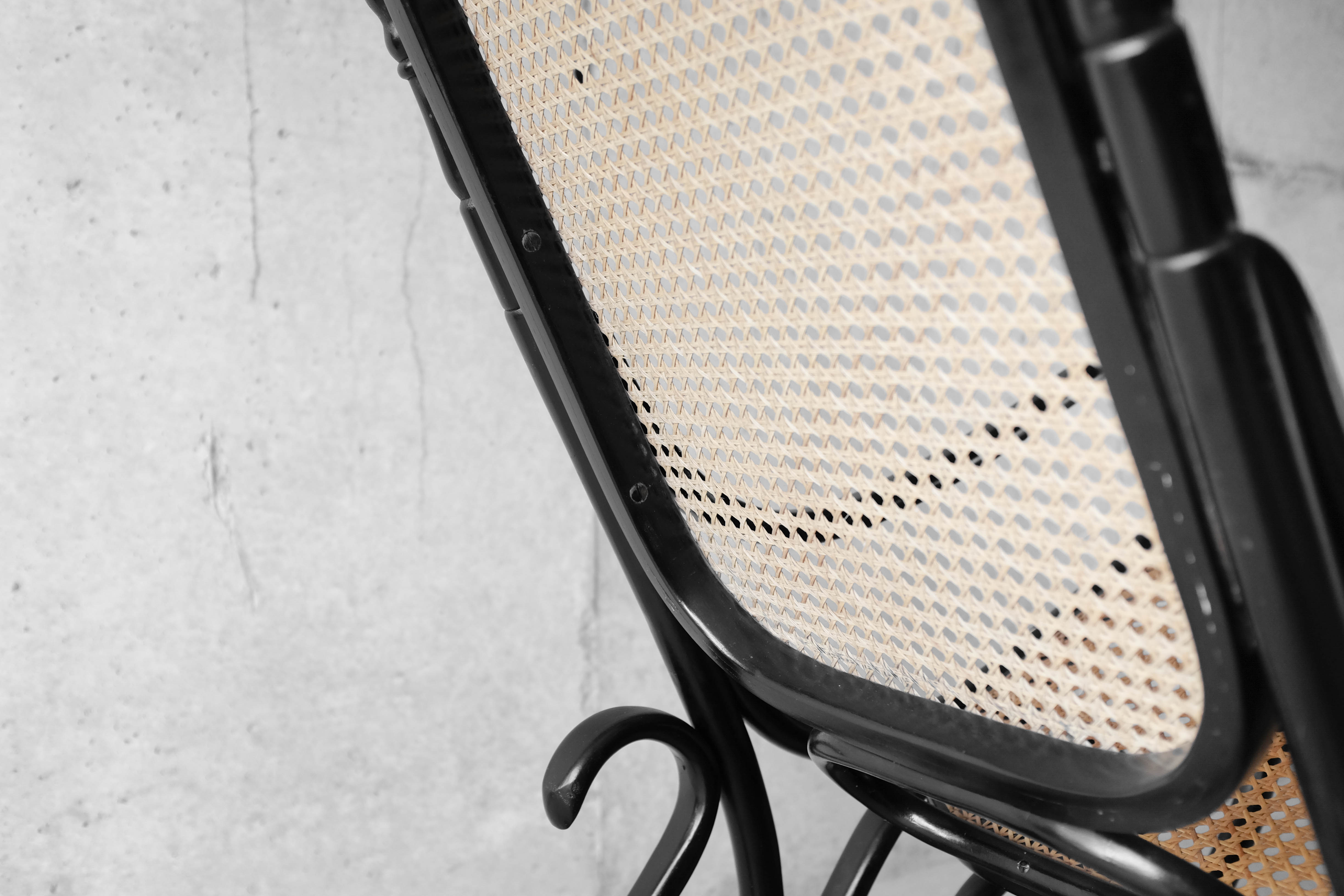 Black rocking chair in curved wood, years 50