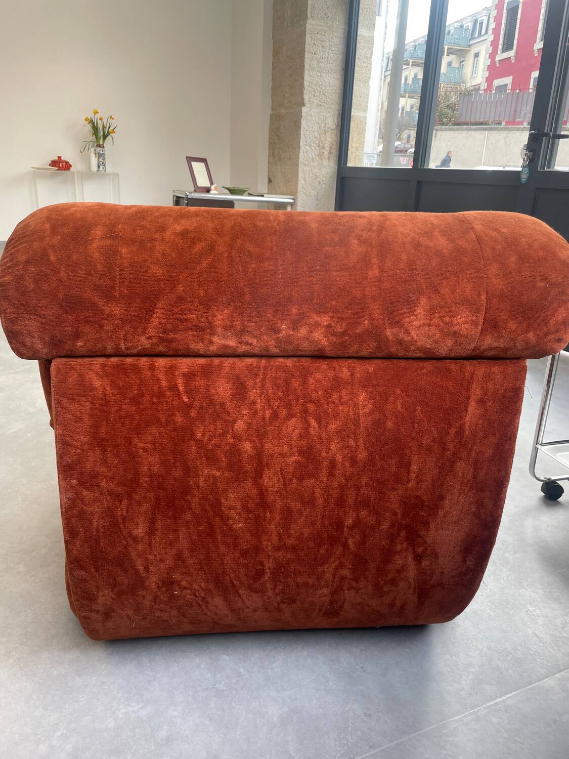 Orange velvet armchair
