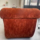 Orange velvet armchair