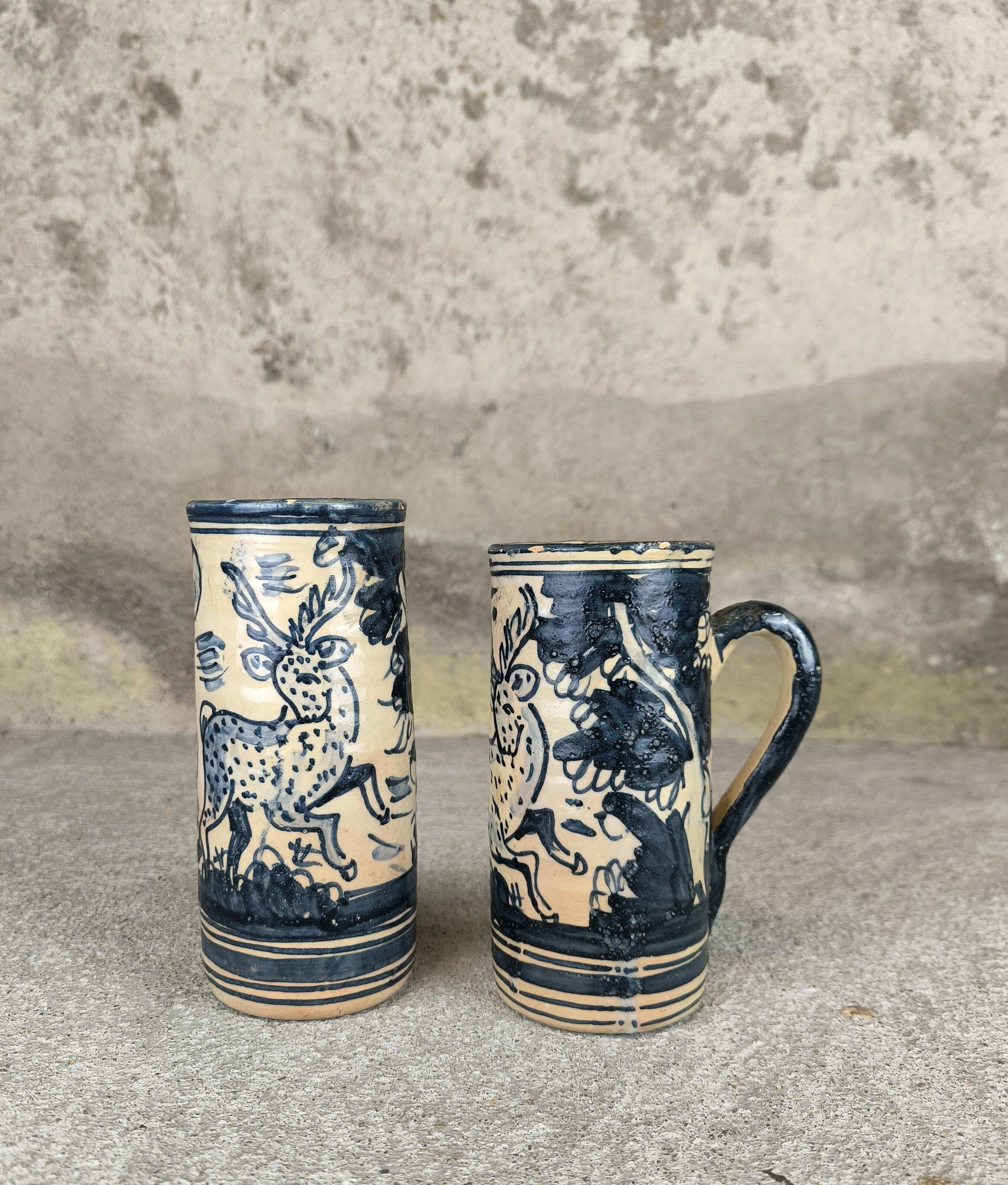 Set of two large vintage glazed terracotta mugs.