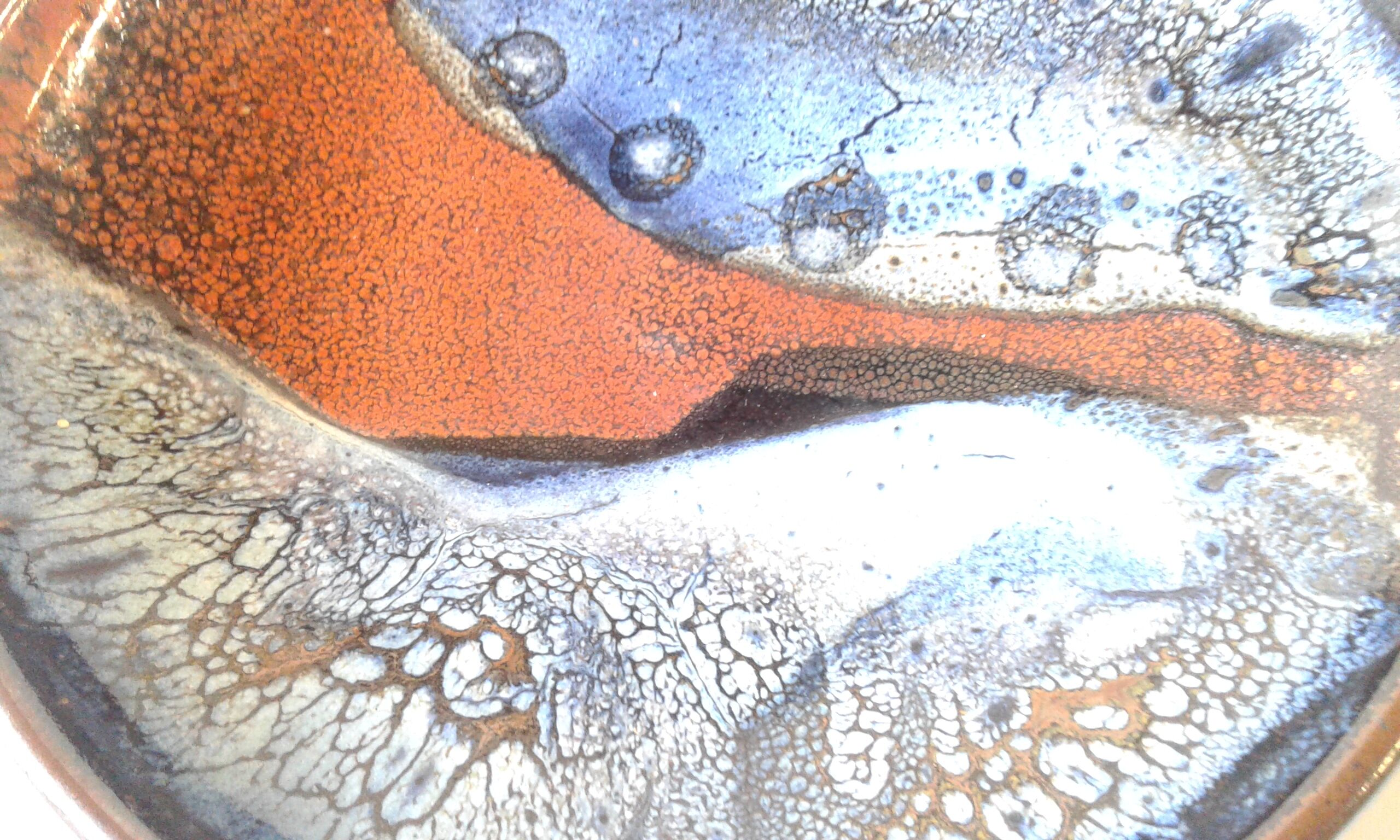 Enamelled sandstone cup