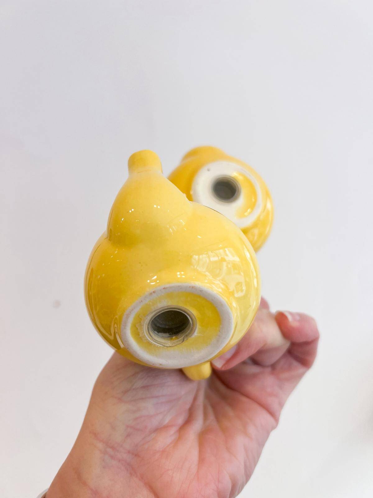 Salt and pepper shakers in the shape of a teapot.