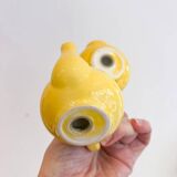 Salt and pepper shakers in the shape of a teapot.