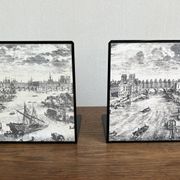Bookends 1960 between Fornasetti's grey and Toile de Jouy views of Paris.