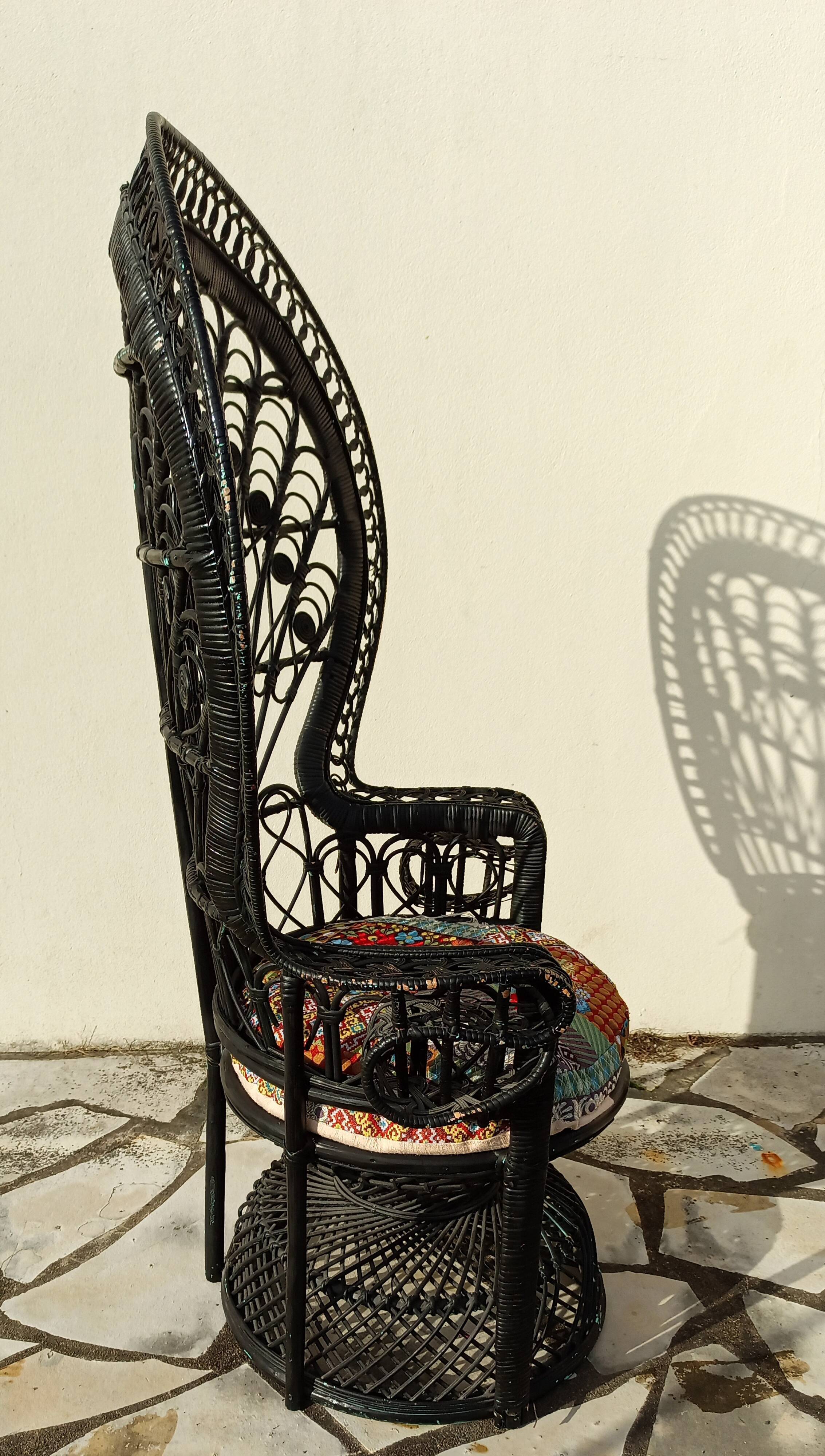 Fauteuil Emmanuelle peacock rotin