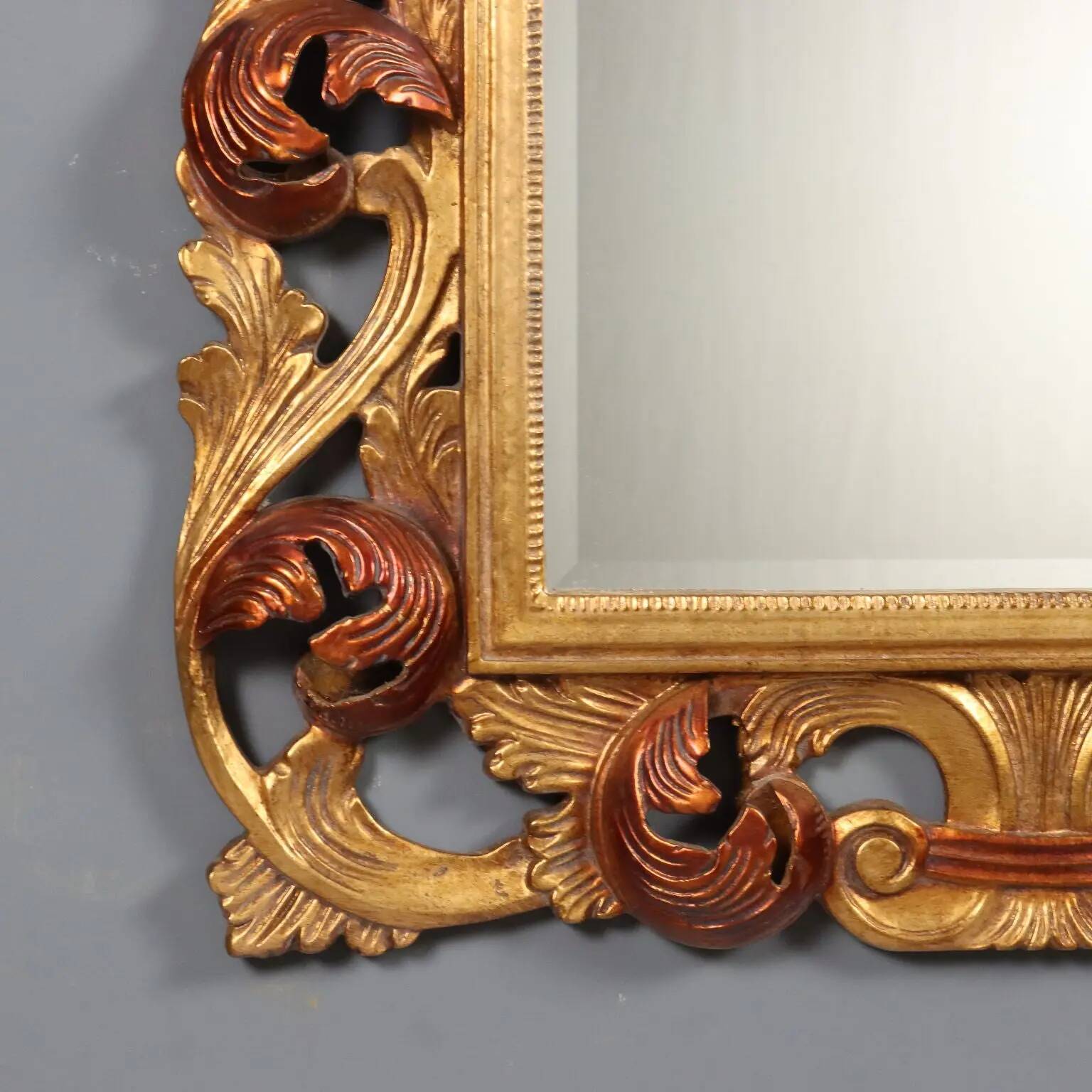 Antique baroque style mirror in carved wood, Italy, 20th century.