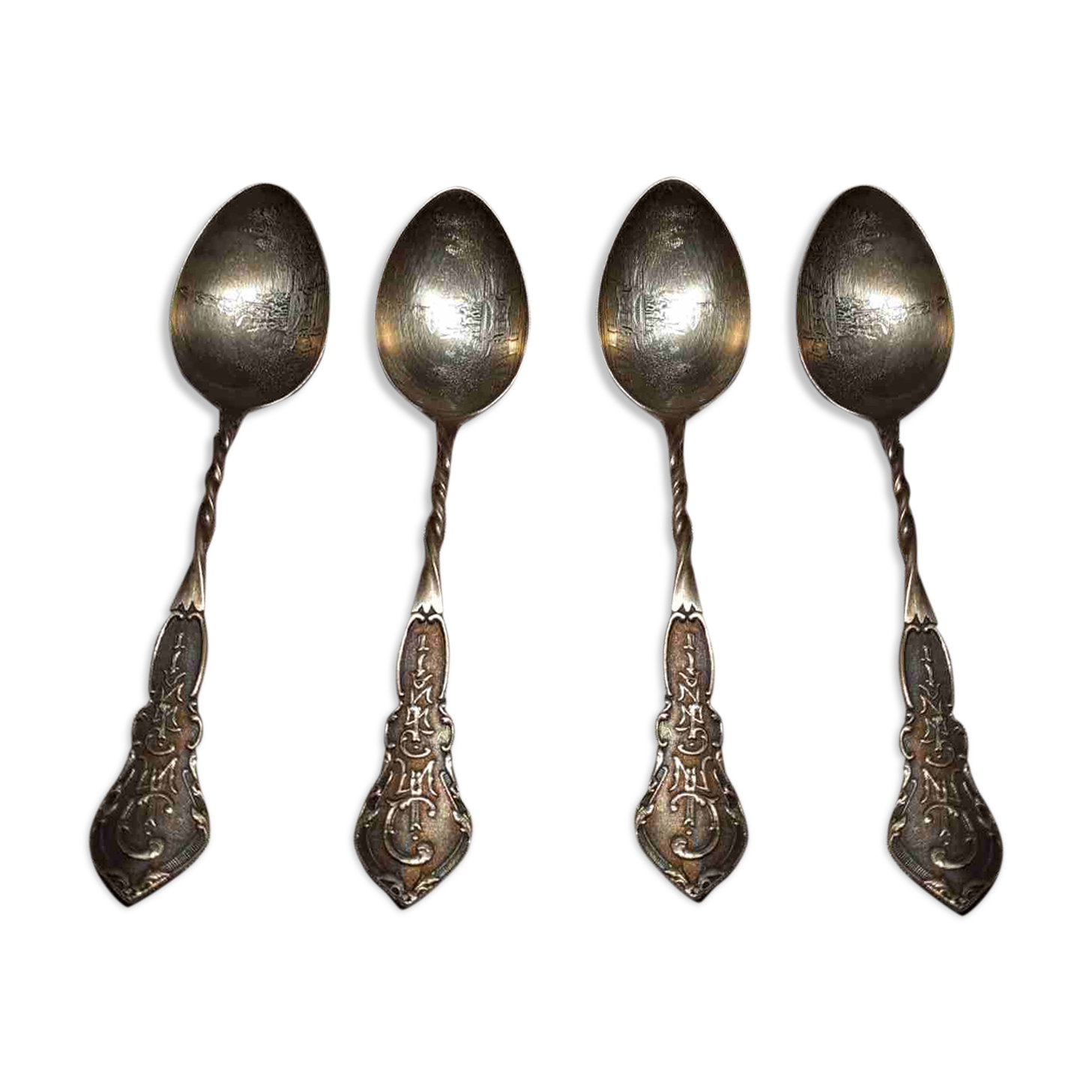 4 Silver teaspoons