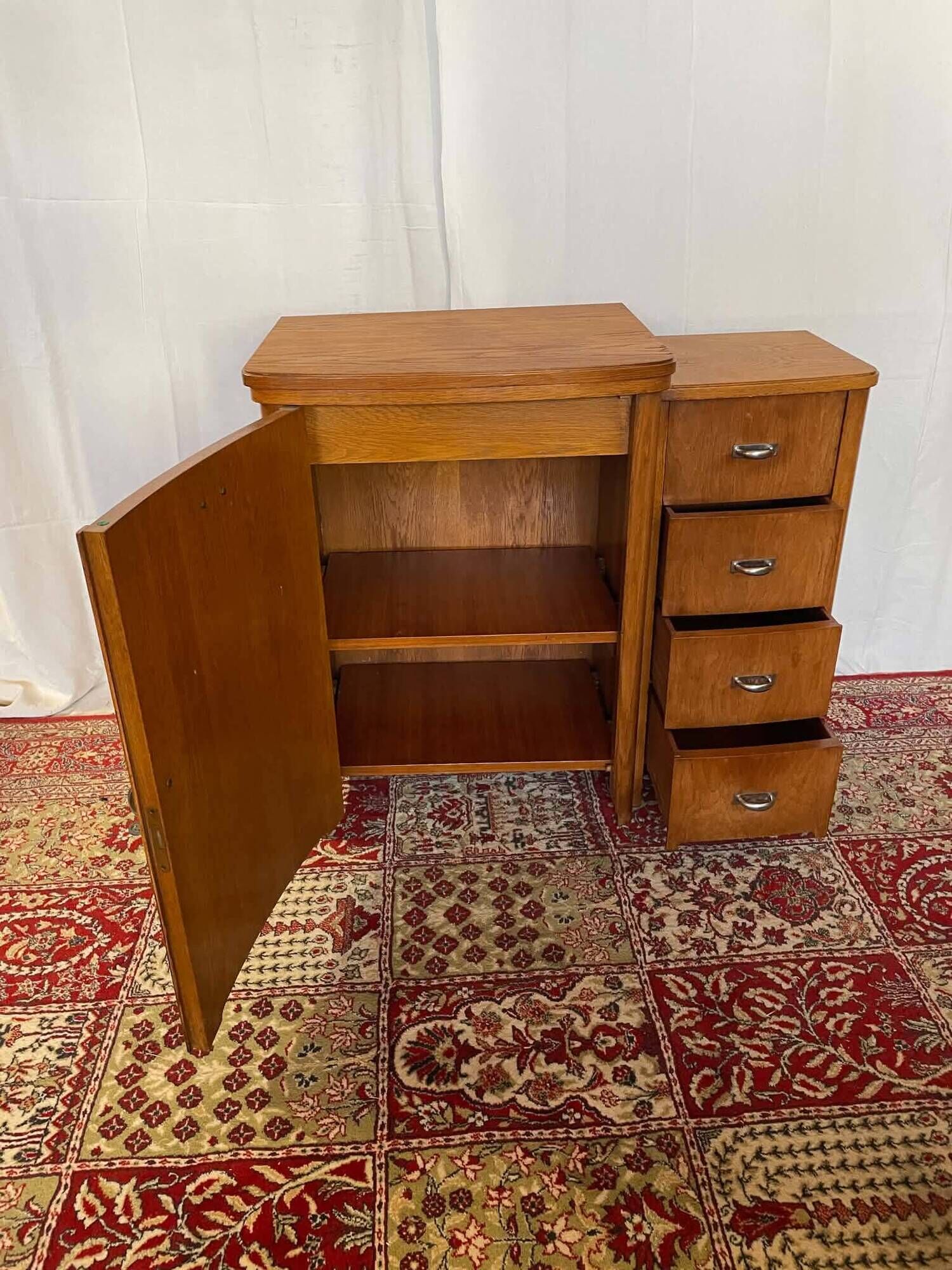 Old sewing cabinet with drawers