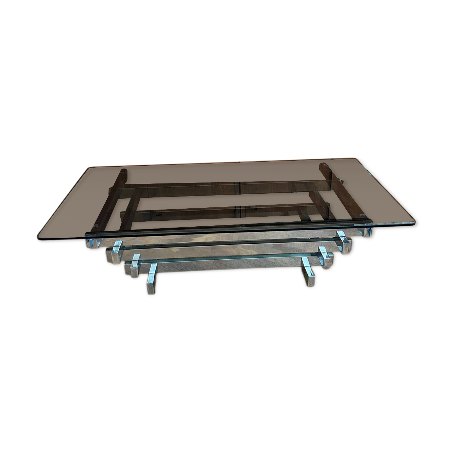 70s design coffee table in rectangular glass with chrome legs.