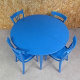 round table with 4 chairs and 2 extensions