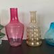Série de 4 vases vintage en verre coloré