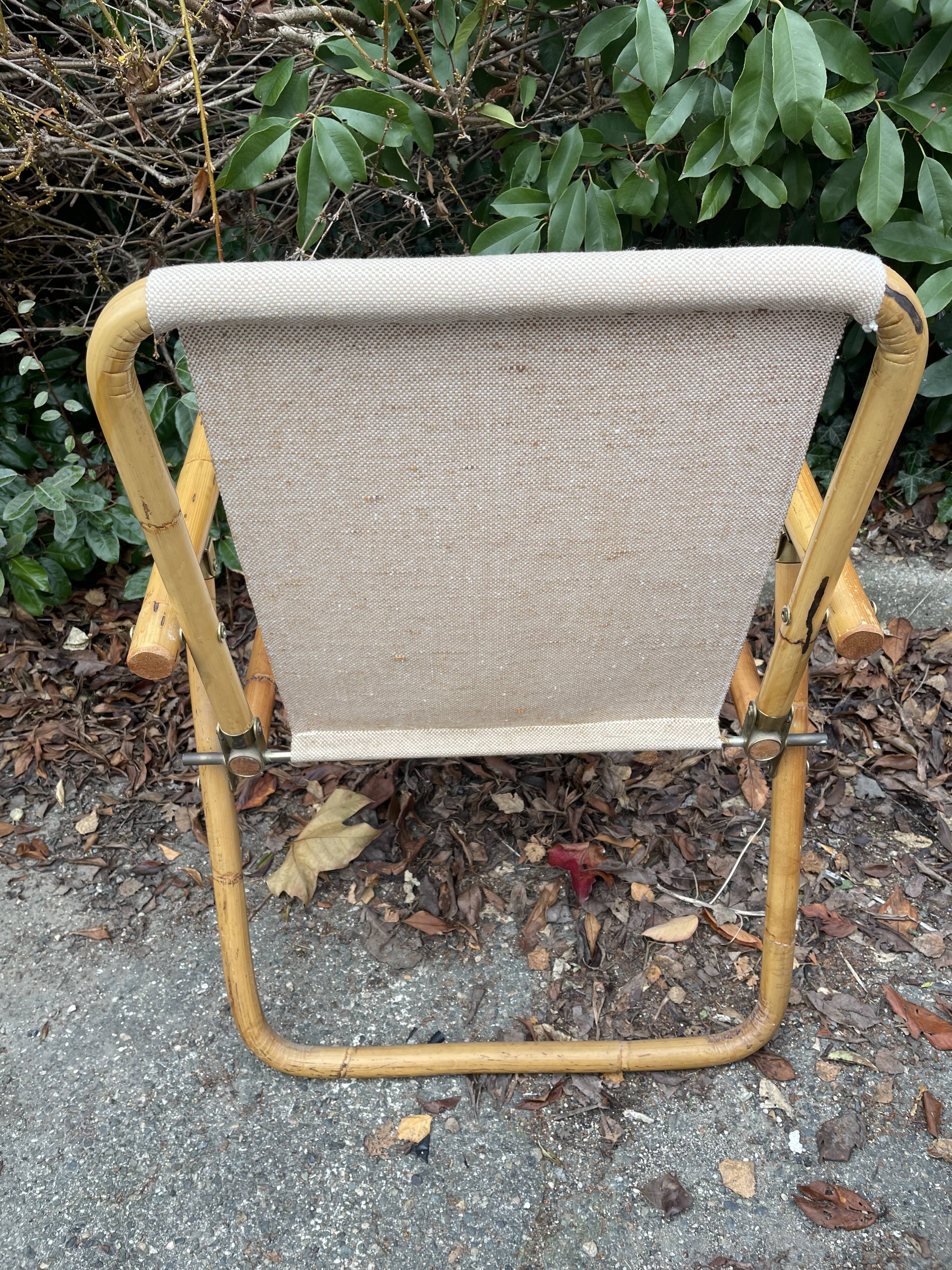 Rattan armchair and foldable canvas